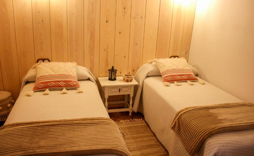 Postel nebo postele na pokoji v ubytování CASA DONDELA