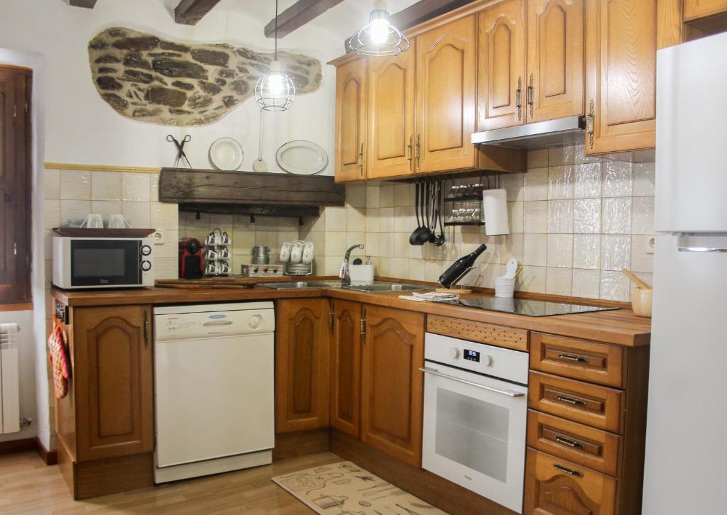 Kuchyň nebo kuchyňský kout v ubytování CASA DONDELA