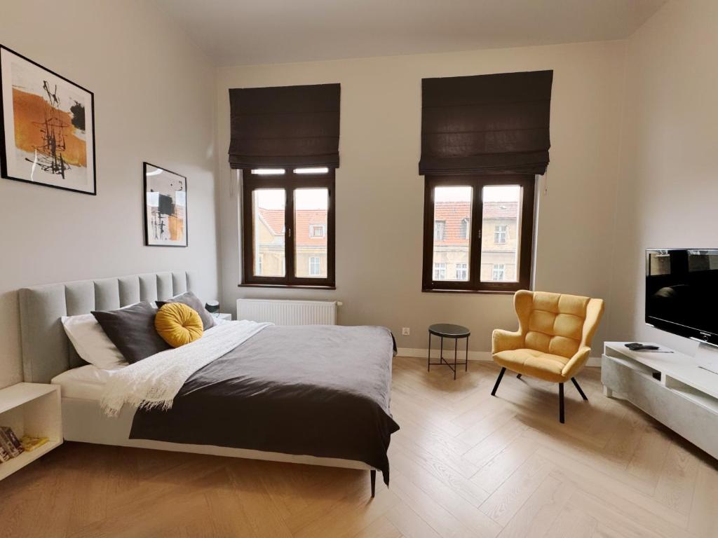 Posteľ alebo postele v izbe v ubytovaní Apartament_poznań CH10