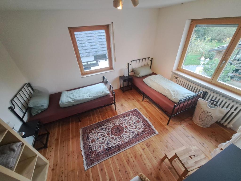 Postel nebo postele na pokoji v ubytování Zimmer am Main