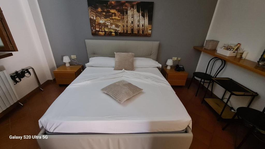 Voodi või voodid majutusasutuse ALBERGO LA SCALETTA toas