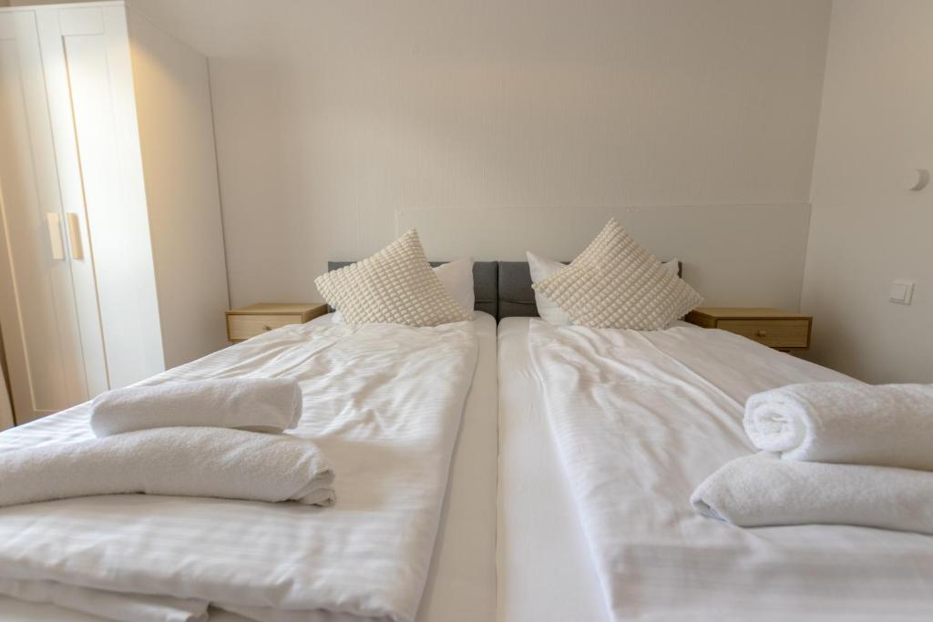 Postel nebo postele na pokoji v ubytování Hotel Doerenkamp - Digital Access