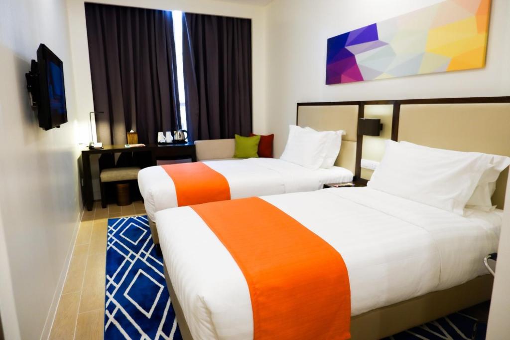 Postel nebo postele na pokoji v ubytování Hotel Lucky Chinatown Binondo