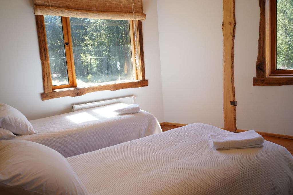 Postel nebo postele na pokoji v ubytování Pu Am Eco Lodge