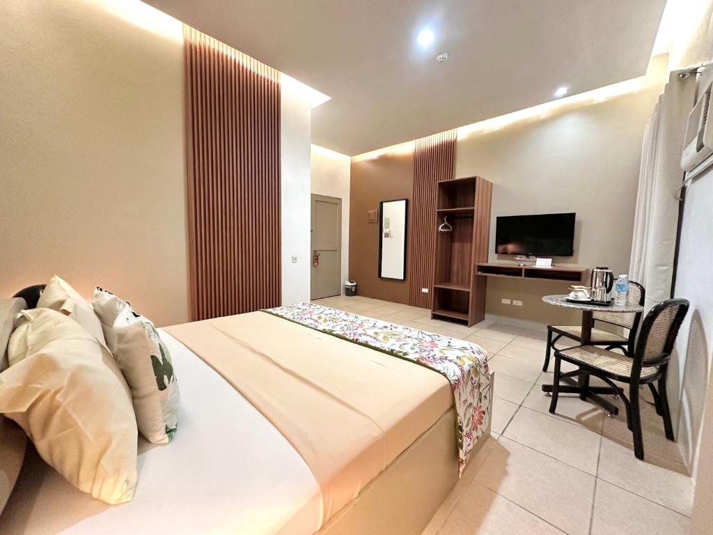 TV a/nebo společenská místnost v ubytování Hotel Nicanor
