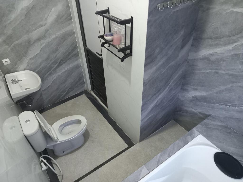 Ένα μπάνιο στο House Of Elea SYARIAH