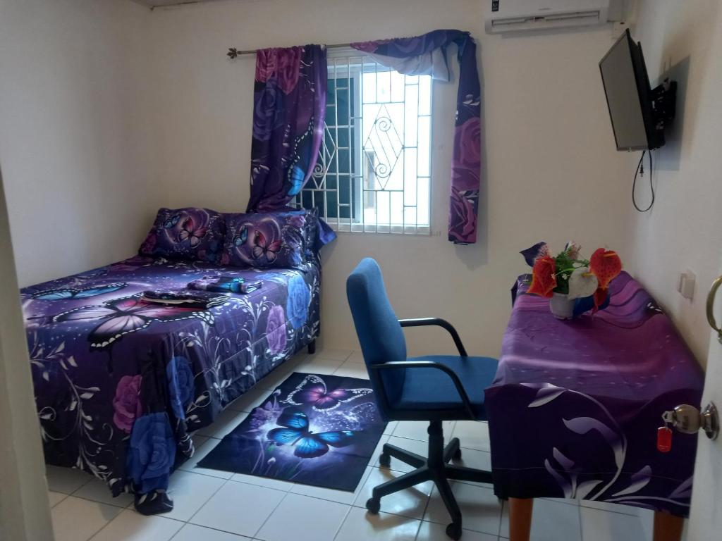 Postel nebo postele na pokoji v ubytování Holiday rooms in St Thomas Jamaica
