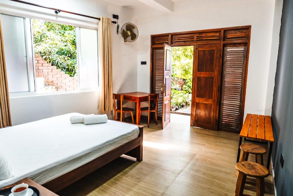 Postel nebo postele na pokoji v ubytování SERENE HOME