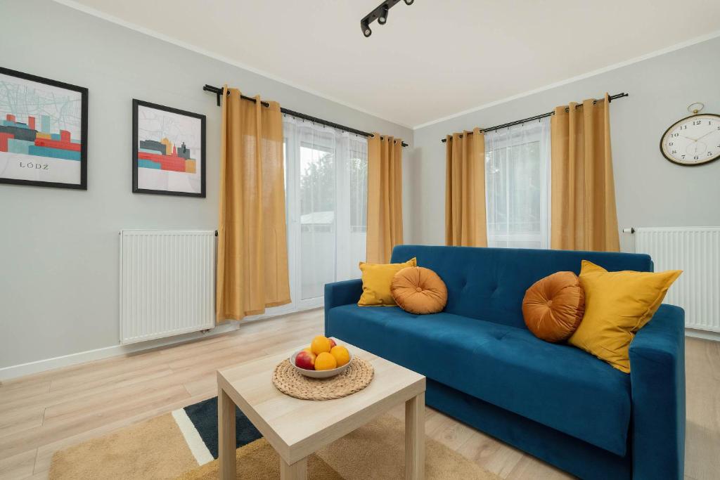 Posezení v ubytování Stylowy Apartament z Parkingiem Łódź by Noclegi Renters