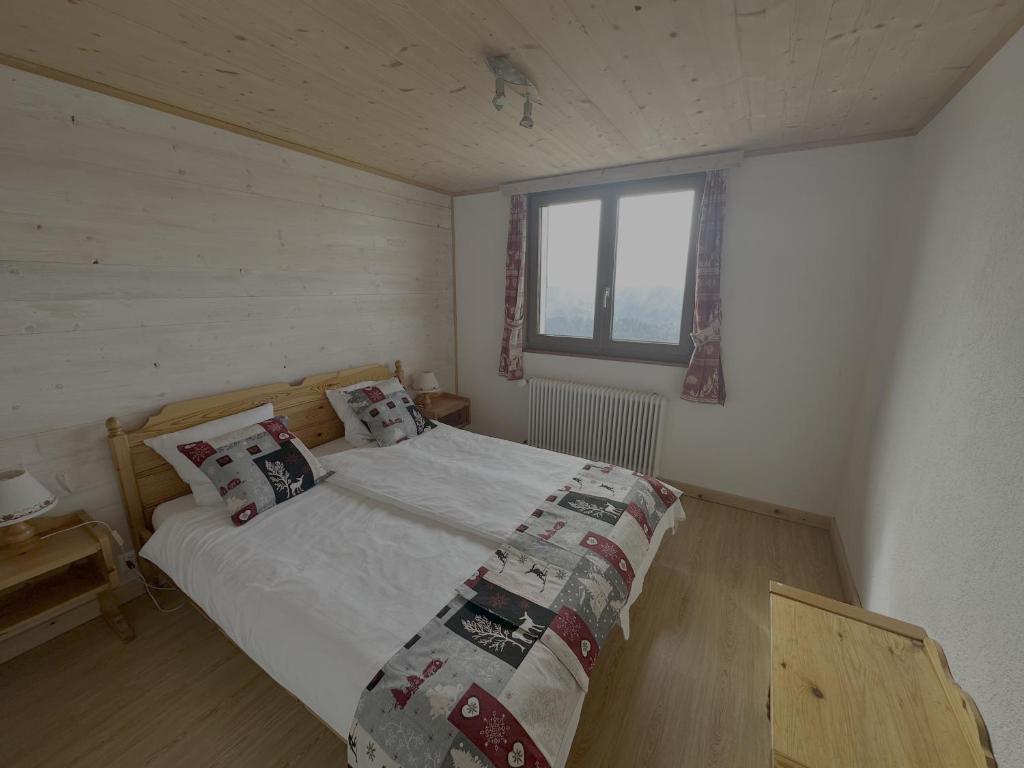Postel nebo postele na pokoji v ubytování Hotel Le Chaudron Ski In Ski Out