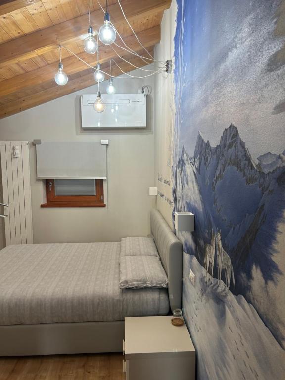 Postel nebo postele na pokoji v ubytování B&B Valtilí