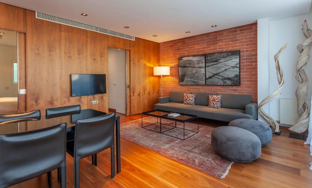 TV a/nebo společenská místnost v ubytování Suites Avenue
