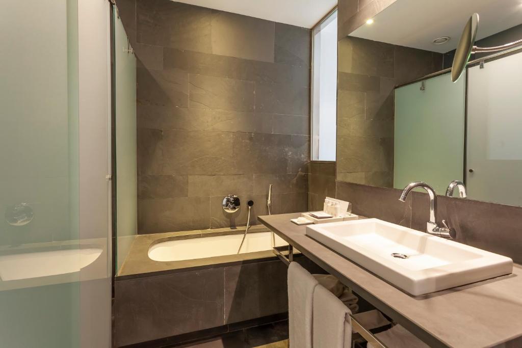 Koupelna v ubytování Suites Avenue