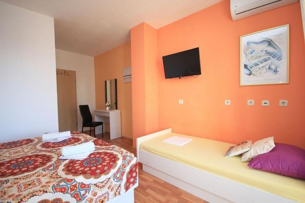 Postel nebo postele na pokoji v ubytování Apartments JoviZe
