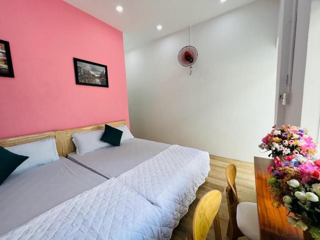 Postel nebo postele na pokoji v ubytování Homestay Little Quy Nhơn
