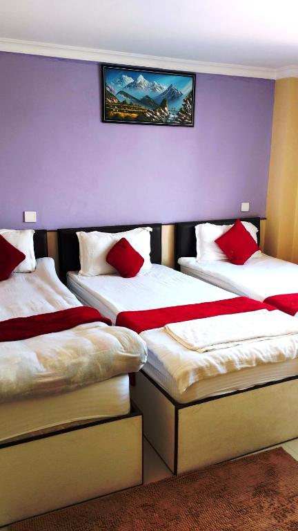 Postel nebo postele na pokoji v ubytování Hotel Tranquil