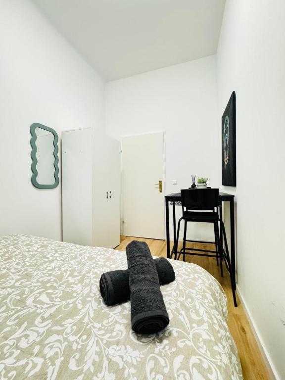 4BR Shared Apt with City View Only 7- Min to Westbahnhof的电视和/或娱乐中心