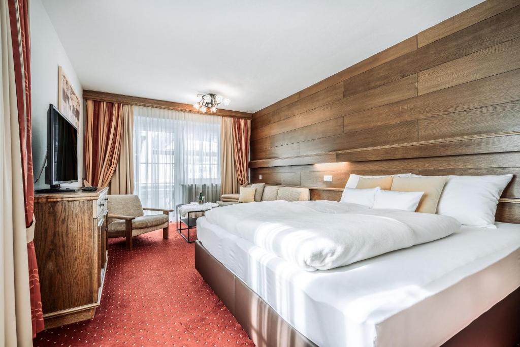 Postel nebo postele na pokoji v ubytování Fortuna Apart Hotel B&B
