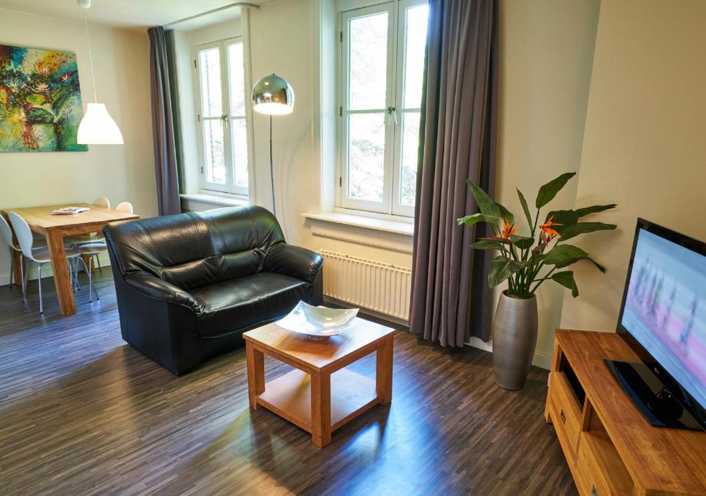 TV a/nebo společenská místnost v ubytování Amrâth Hotel Media Park Hilversum