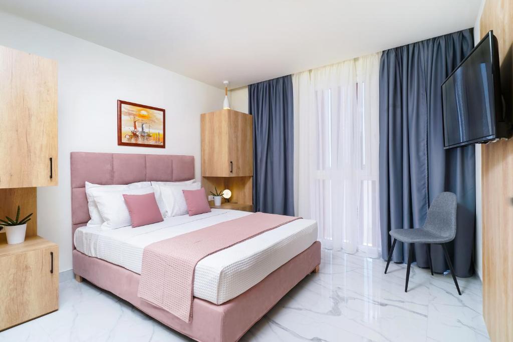 Postel nebo postele na pokoji v ubytování Hotel ASTERA