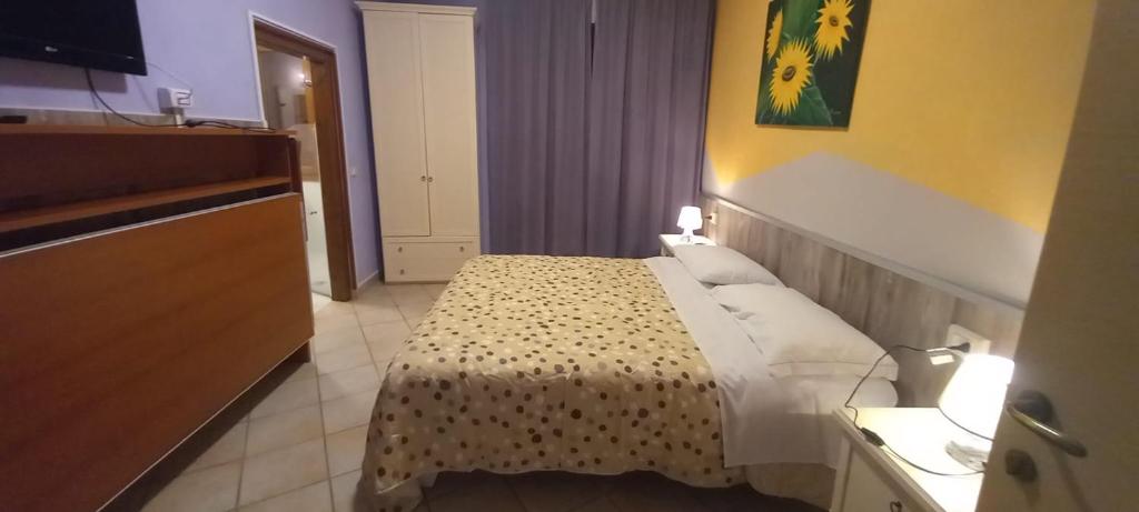 Postel nebo postele na pokoji v ubytování Hotel Le 3 Fonti