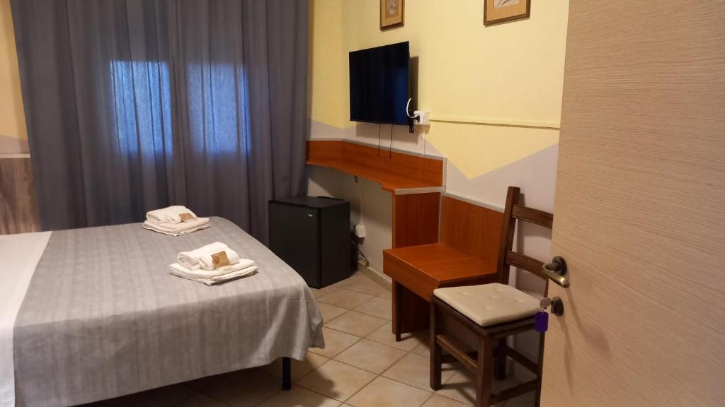 Postel nebo postele na pokoji v ubytování Hotel Le 3 Fonti
