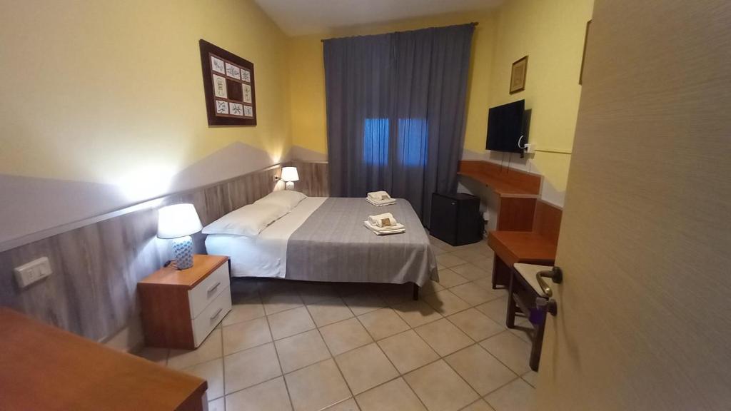 Postel nebo postele na pokoji v ubytování Hotel Le 3 Fonti