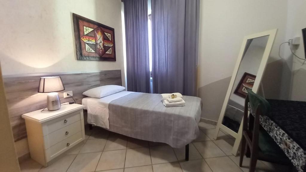 Postel nebo postele na pokoji v ubytování Hotel Le 3 Fonti