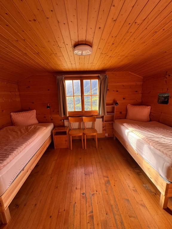 Postel nebo postele na pokoji v ubytování Chalet Berken