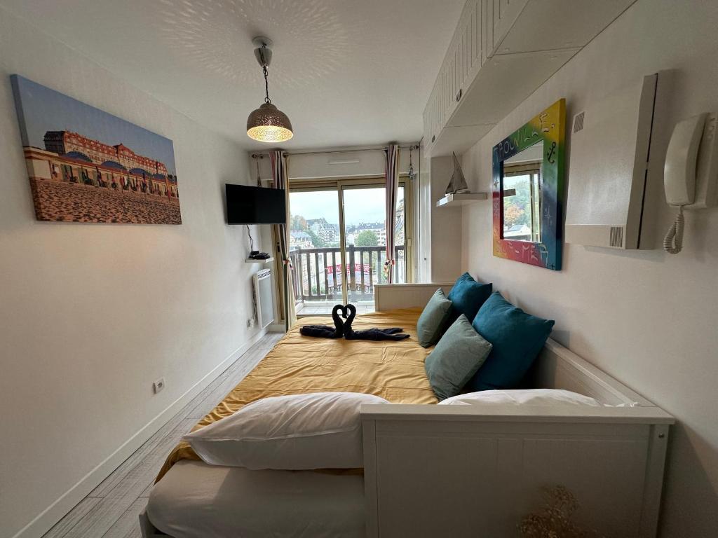 Postel nebo postele na pokoji v ubytování Studio Le Trouvillais proche du centre et de la gare