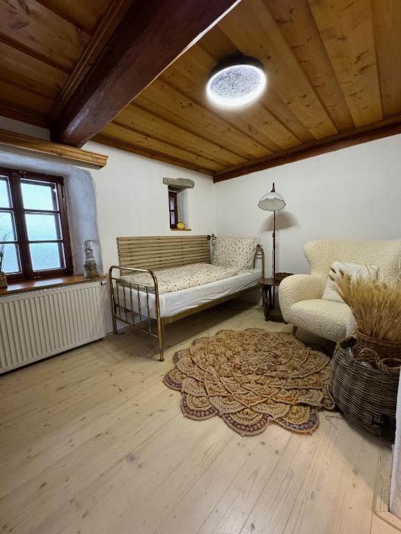 Postel nebo postele na pokoji v ubytování Roubenka Vír