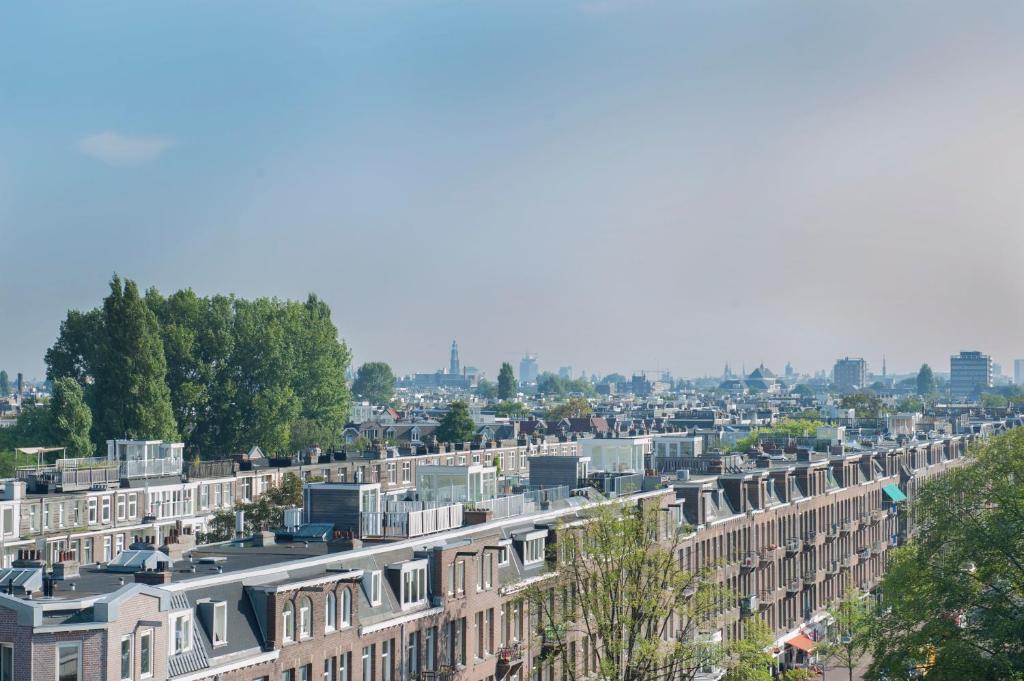 an aerial view of a city with buildings at Conscious Hotel Vondelpark in Amsterdam