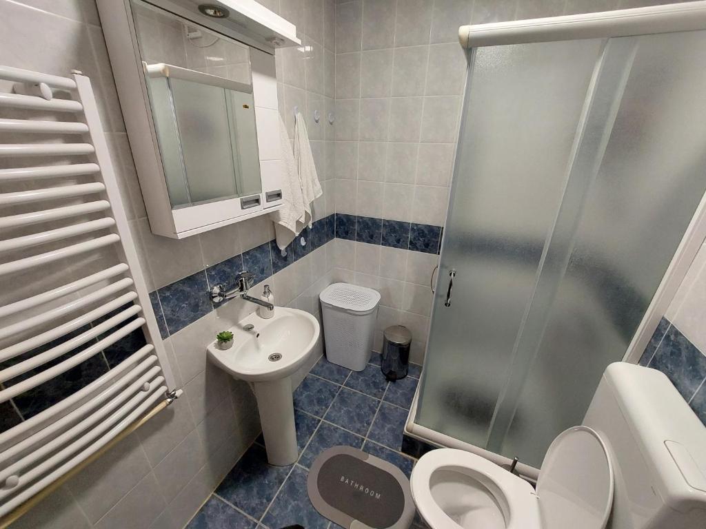 Uma casa de banho em Apartman Sweet Dreams
