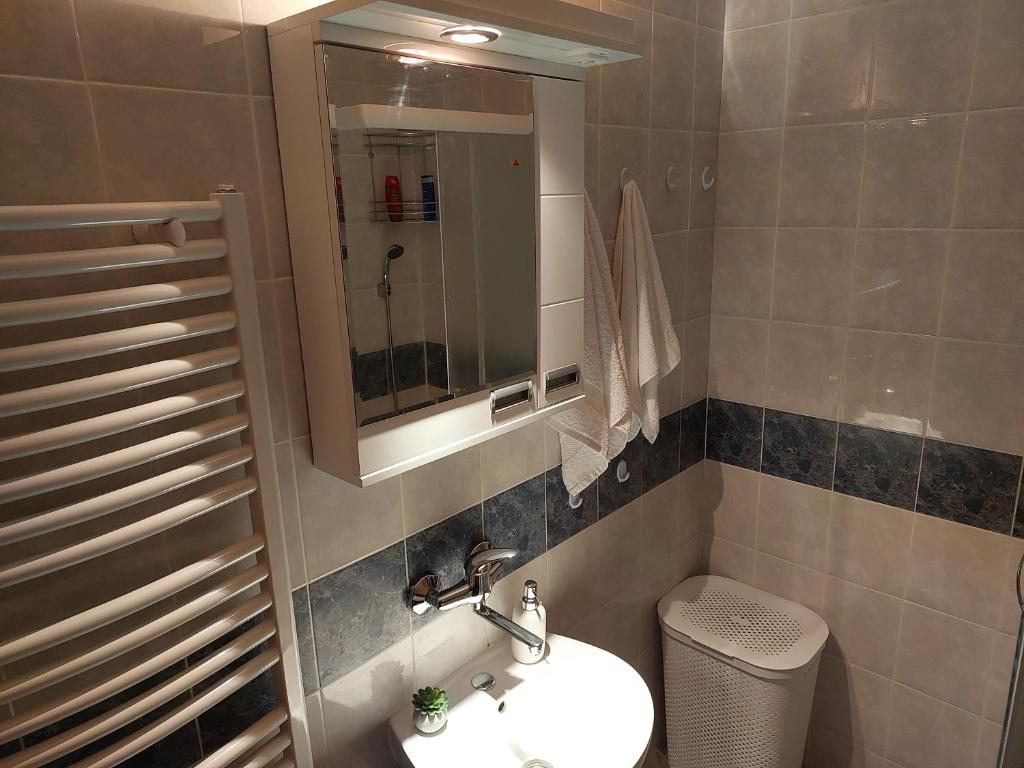 Uma casa de banho em Apartman Sweet Dreams