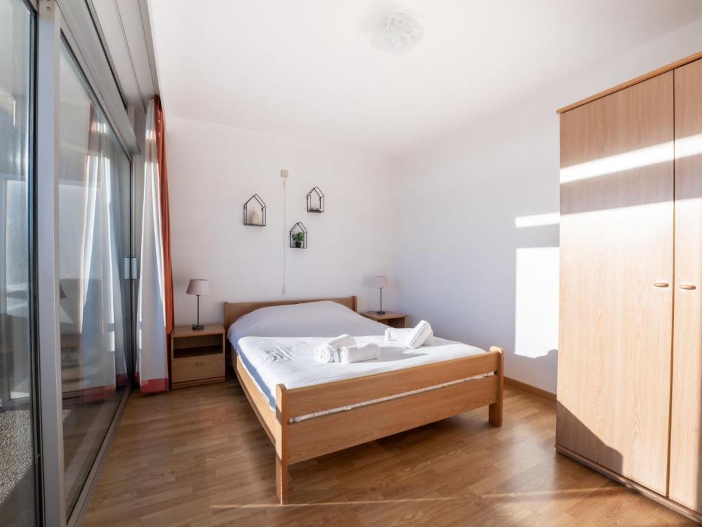 Postel nebo postele na pokoji v ubytování Apartment Appartement 64-202 by Interhome
