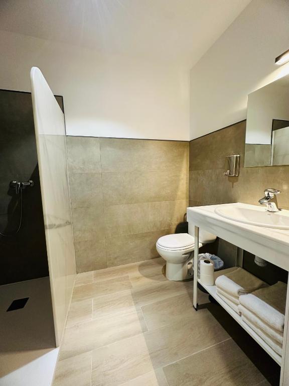 Koupelna v ubytování Hotel Quitagolpe