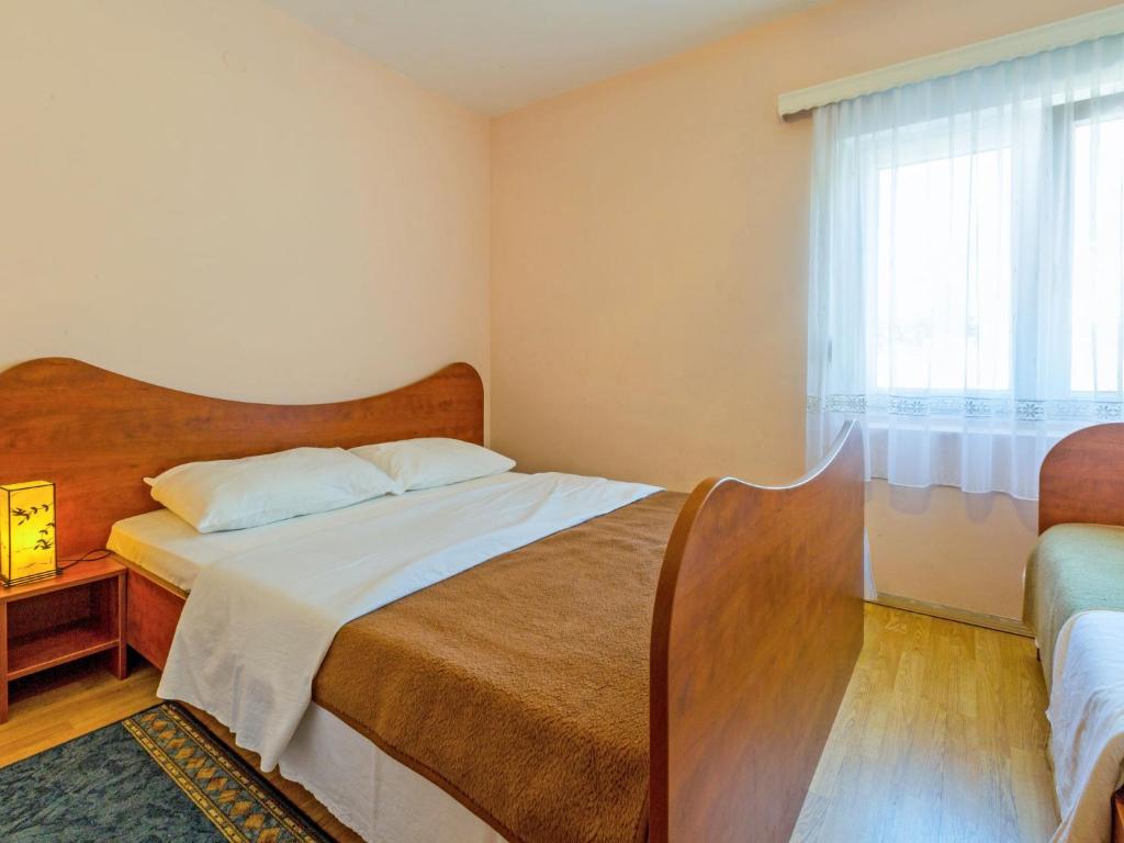 Postel nebo postele na pokoji v ubytování Apartment Delfin-2 by Interhome
