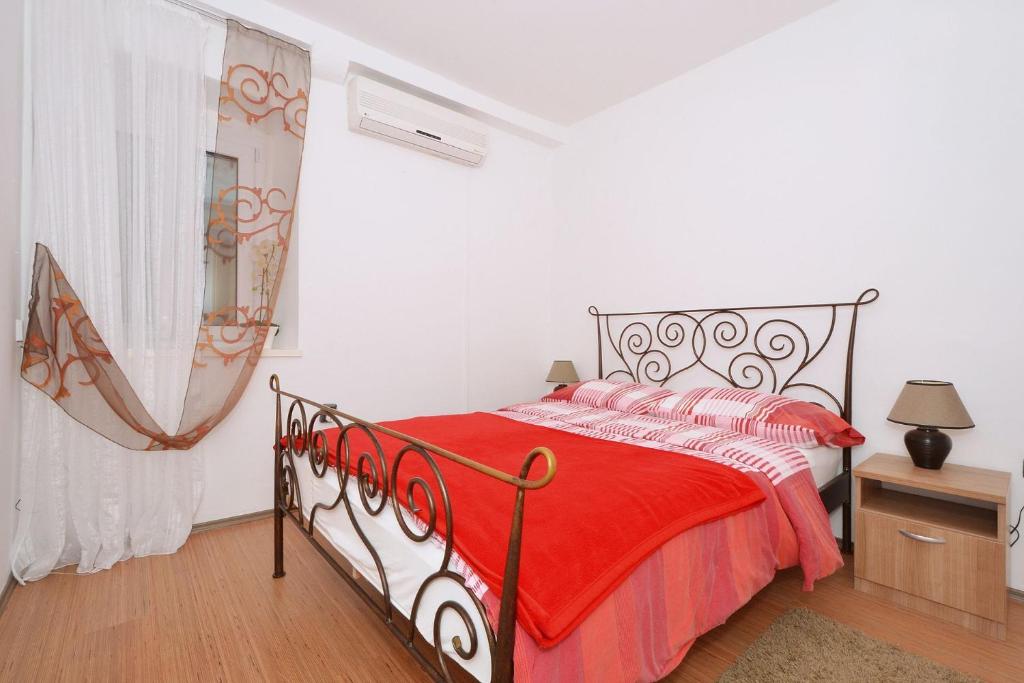 Posteľ alebo postele v izbe v ubytovaní Apartment Irvin