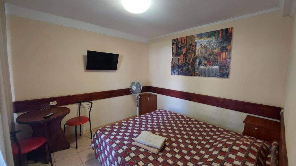 Postel nebo postele na pokoji v ubytování Hotel Desna KUT