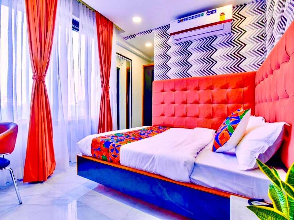 Katil atau katil-katil dalam bilik di Hotel Shubh Hari