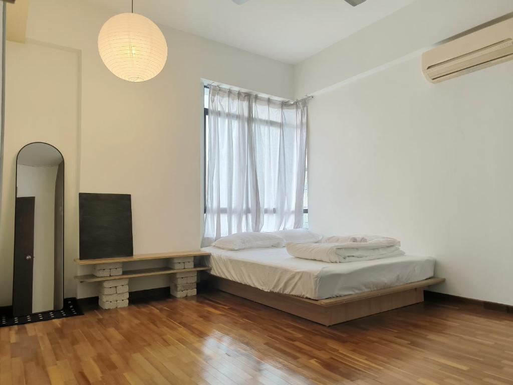 Ένα ή περισσότερα κρεβάτια σε δωμάτιο στο Spacious 4BR condo near KLCC - Travel with MRT