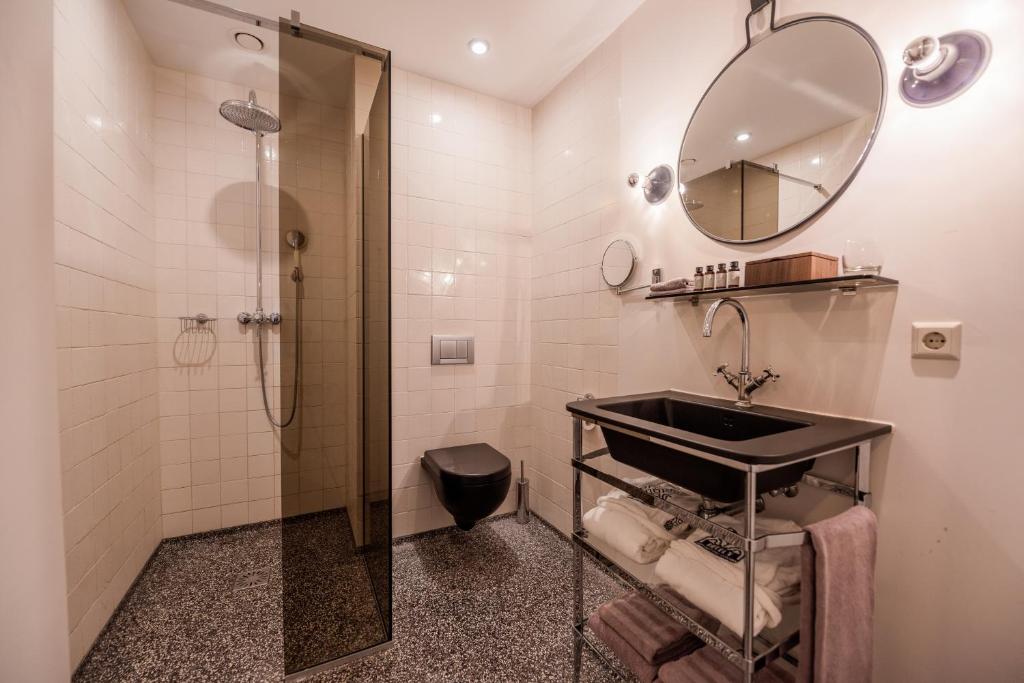 Koupelna v ubytování Hotel V Nesplein