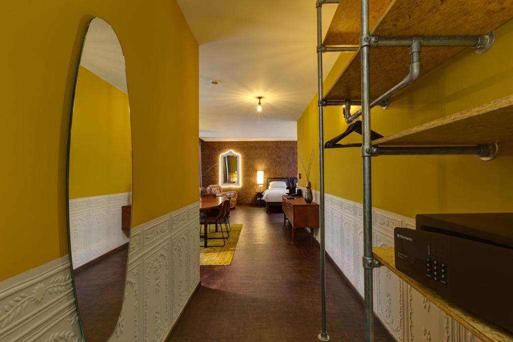 Postel nebo postele na pokoji v ubytování Hotel V Nesplein