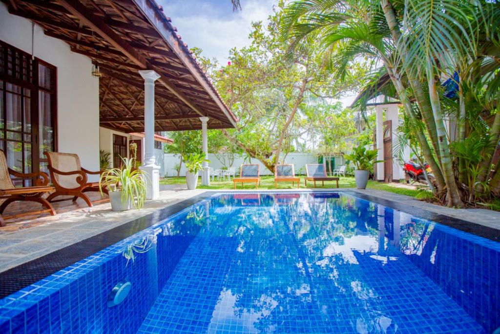 Bazén v ubytování Nibbana Mirissa Hotel nebo v jeho okolí