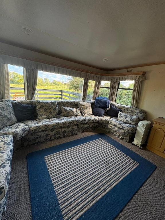 Χώρος καθιστικού στο Compact Holiday Home