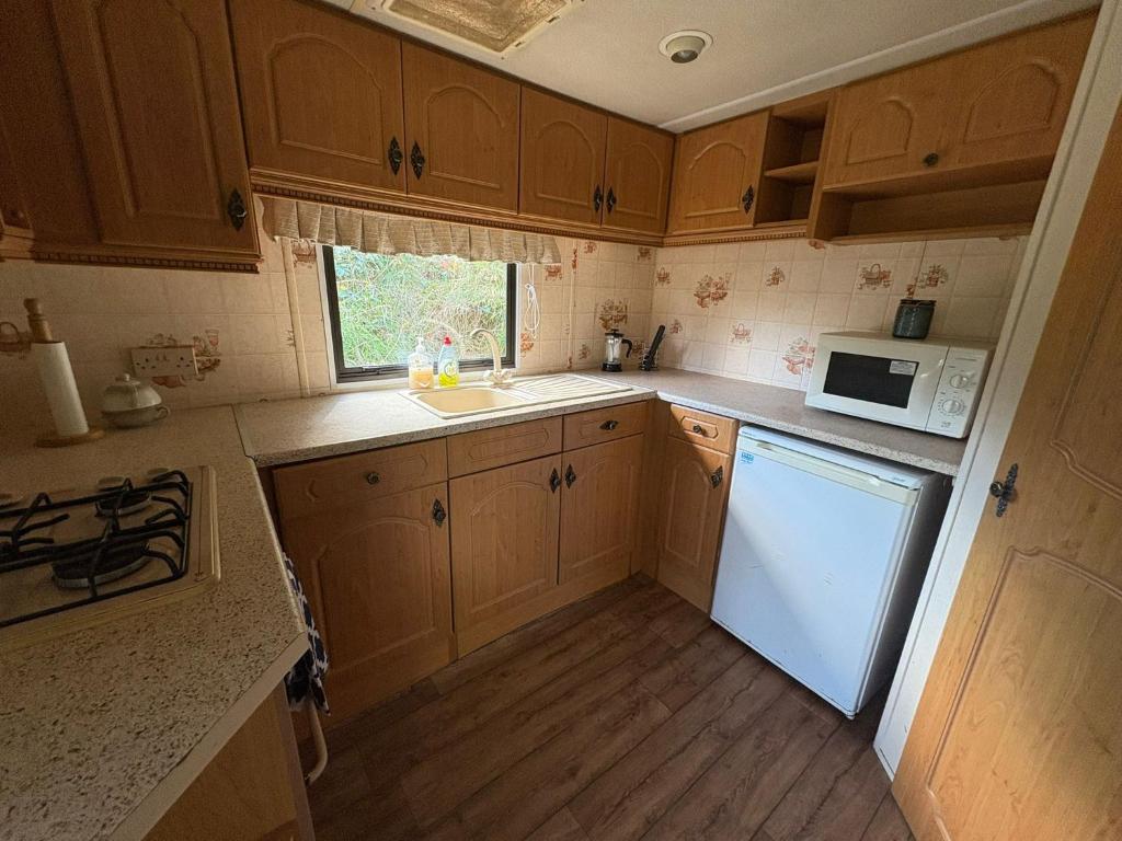 Η κουζίνα ή μικρή κουζίνα στο Compact Holiday Home