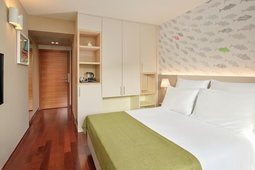 Postel nebo postele na pokoji v ubytování Maistra Select Island Hotel Istra