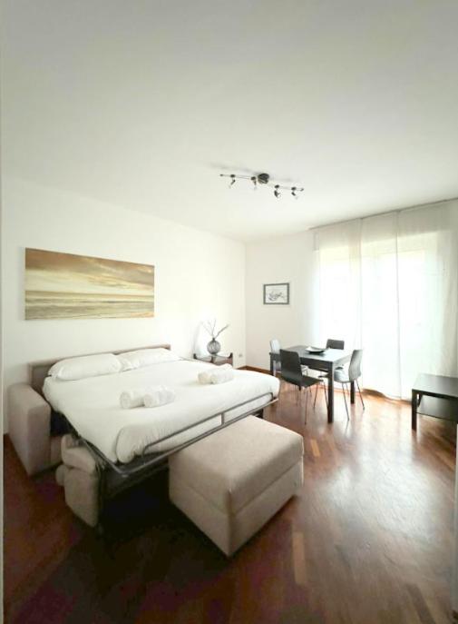 Ένα ή περισσότερα κρεβάτια σε δωμάτιο στο Accomodo MIT67 Trivano Linate