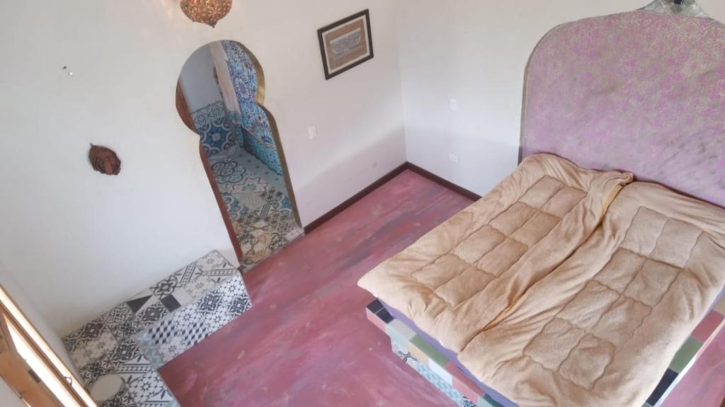 Postel nebo postele na pokoji v ubytování LA SERENA reserva natural