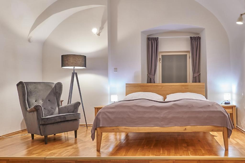Postel nebo postele na pokoji v ubytování Hotel U 3 Pstrosu